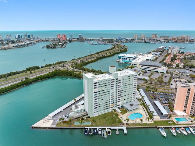 bird's eye view featuring a city view and a water view
