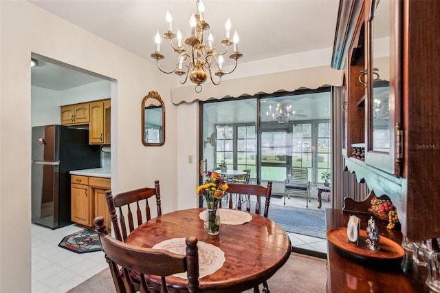 dining space featuring a chandelier