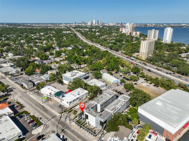 aerial view with a water view and a city view