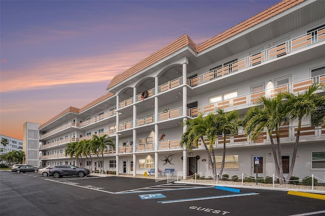 3128 59th St S Unit 206, Gulfport, FL 33707 - view of building exterior featuring uncovered parking
