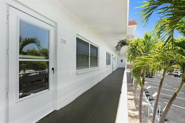 3128 59th St S Unit 206, Gulfport, FL 33707 - view of side of home with stucco siding