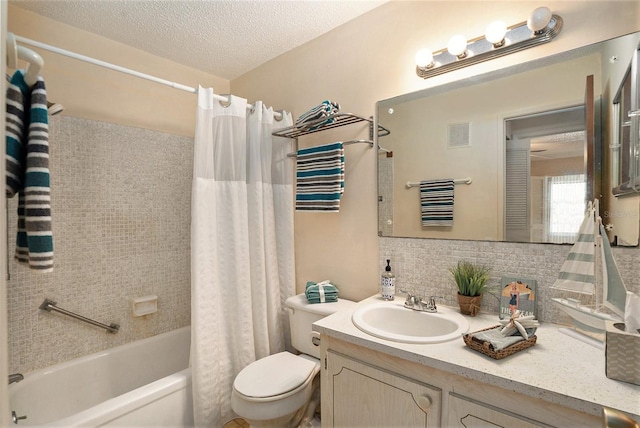 3128 59th St S Unit 206, Gulfport, FL 33707 - bathroom featuring visible vents, tasteful backsplash, shower / tub combo, vanity, and toilet