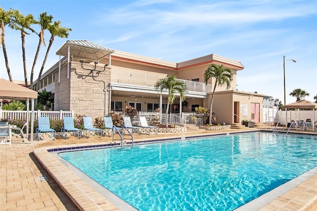 3128 59th St S Unit 206, Gulfport, FL 33707 - pool with a gazebo, fence, and a patio