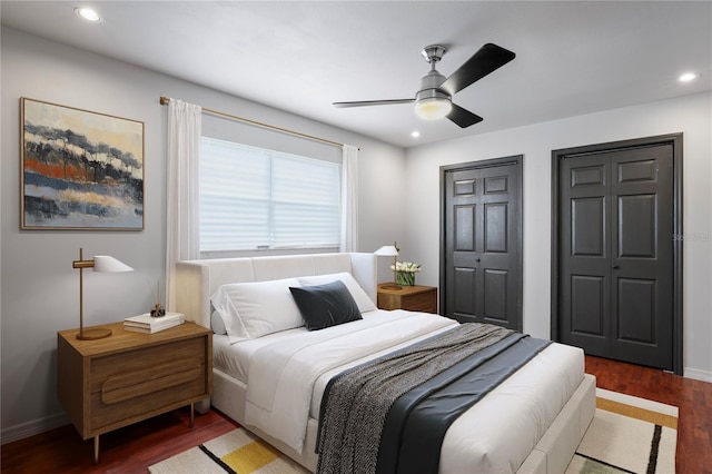 3353 Montano Ave, Spring Hill, FL 34609 - bedroom with wood finished floors, baseboards, multiple closets, and recessed lighting