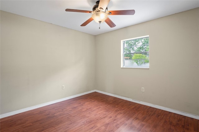 3353 Montano Ave, Spring Hill, FL 34609 - empty room with wood finished floors, baseboards, and ceiling fan