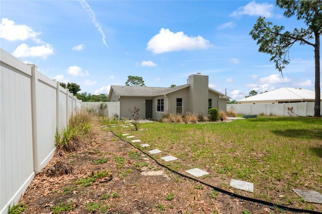 3353 Montano Ave, Spring Hill, FL 34609 - view of yard featuring a fenced backyard