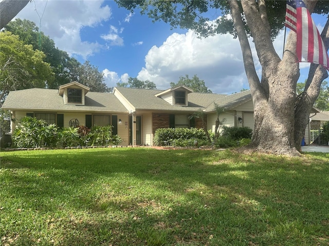 8361 Cofield Ln, Spring Hill, FL 34608 - ranch-style home with a front yard