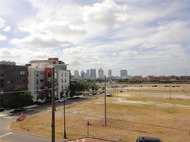surrounding community featuring a city view