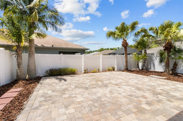 25830 Crippen Dr, Land O Lakes, FL 34639 - fenced backyard with a patio