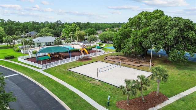 25830 Crippen Dr, Land O Lakes, FL 34639 - surrounding community with volleyball court and a yard