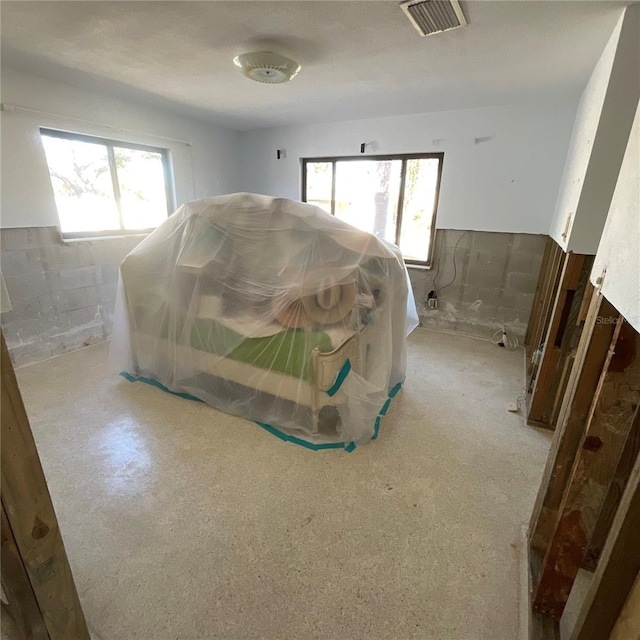 2015 Dolphin Blvd S, Saint Petersburg, FL 33707 - bedroom with visible vents and concrete block wall