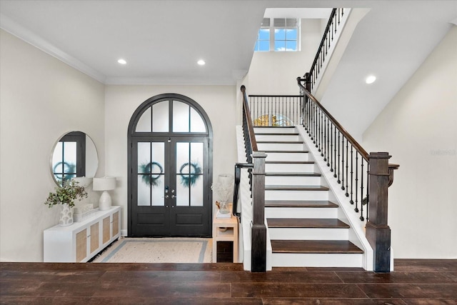 885 Seaview Cir Unit 20, Crystal Beach, FL 34681 - entryway featuring stairs, recessed lighting, wood finished floors, french doors, and crown molding