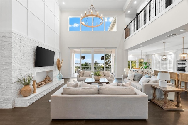 885 Seaview Cir Unit 20, Crystal Beach, FL 34681 - living room with a chandelier, healthy amount of natural light, recessed lighting, and a towering ceiling
