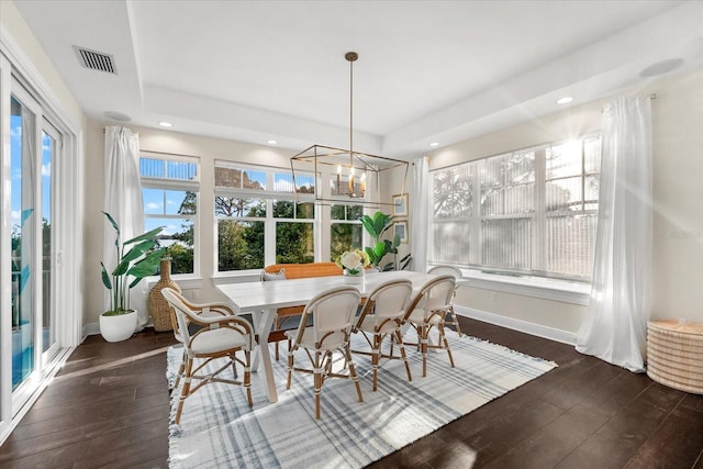 885 Seaview Cir Unit 20, Crystal Beach, FL 34681 - dining room with healthy amount of natural light, dark wood-style flooring, baseboards, and recessed lighting