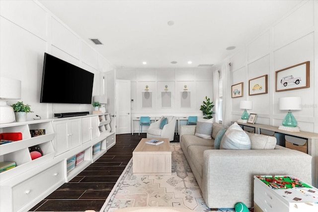 885 Seaview Cir Unit 20, Crystal Beach, FL 34681 - living area with wood tiled floors, a decorative wall, and recessed lighting