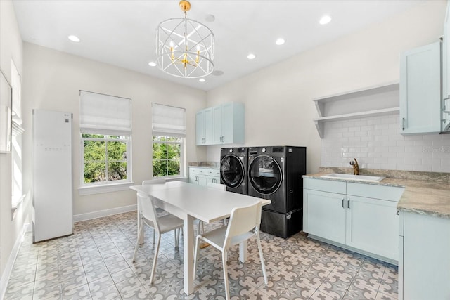 885 Seaview Cir Unit 20, Crystal Beach, FL 34681 - dining room with independent washer and dryer, baseboards, a chandelier, recessed lighting, and light tile patterned floors
