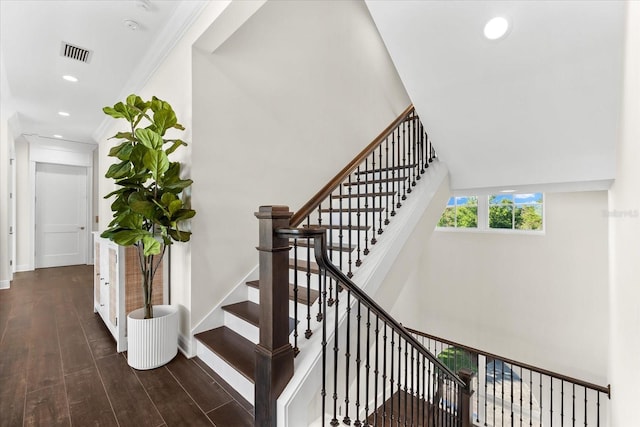 885 Seaview Cir Unit 20, Crystal Beach, FL 34681 - staircase with wood finished floors, recessed lighting, baseboards, and crown molding