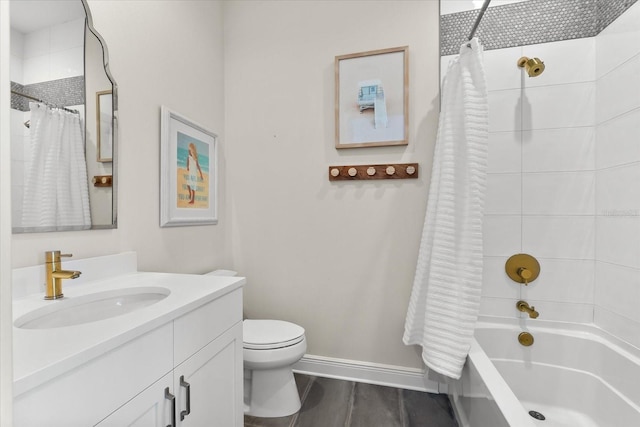 885 Seaview Cir Unit 20, Crystal Beach, FL 34681 - bathroom featuring toilet, shower / bath combo, vanity, and baseboards