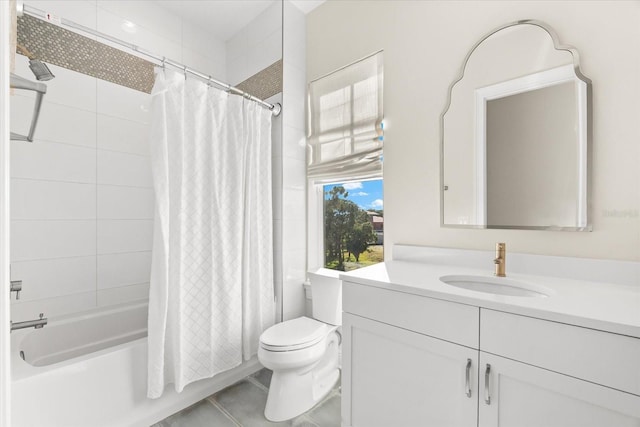 885 Seaview Cir Unit 20, Crystal Beach, FL 34681 - full bathroom featuring toilet, vanity, shower / tub combo with curtain, and tile patterned floors