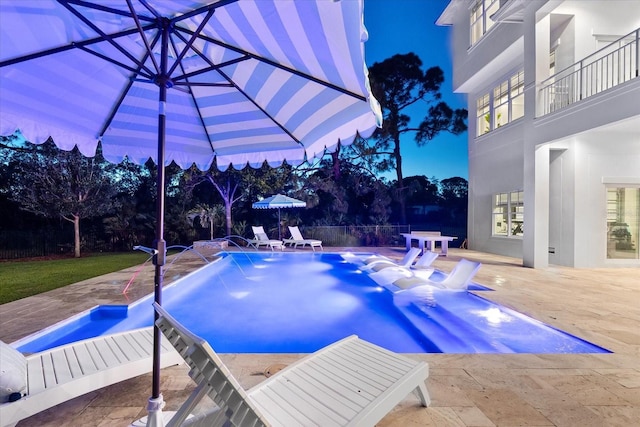 885 Seaview Cir Unit 20, Crystal Beach, FL 34681 - pool at night with a patio and an outdoor pool