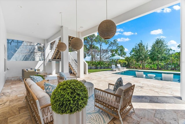 885 Seaview Cir Unit 20, Crystal Beach, FL 34681 - view of patio featuring stairs, outdoor lounge area, and an outdoor pool
