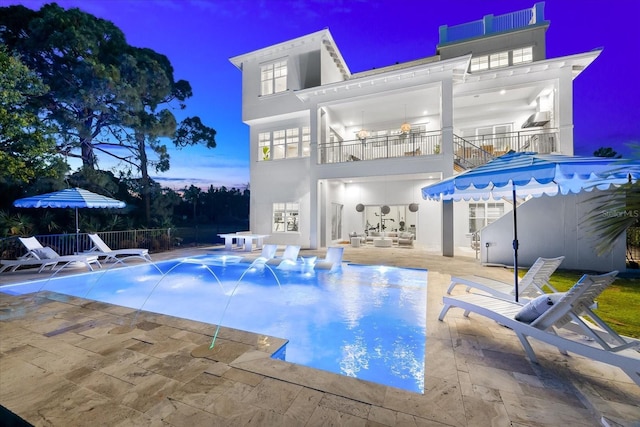 885 Seaview Cir Unit 20, Crystal Beach, FL 34681 - back of property featuring a balcony and a patio