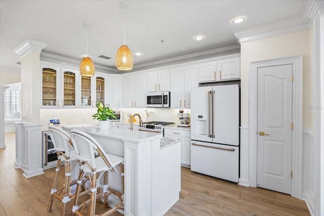 1476 Harbour Walk Rd, Tampa, FL 33602 - kitchen featuring white appliances, ornamental molding, glass insert cabinets, light countertops, and white cabinetry