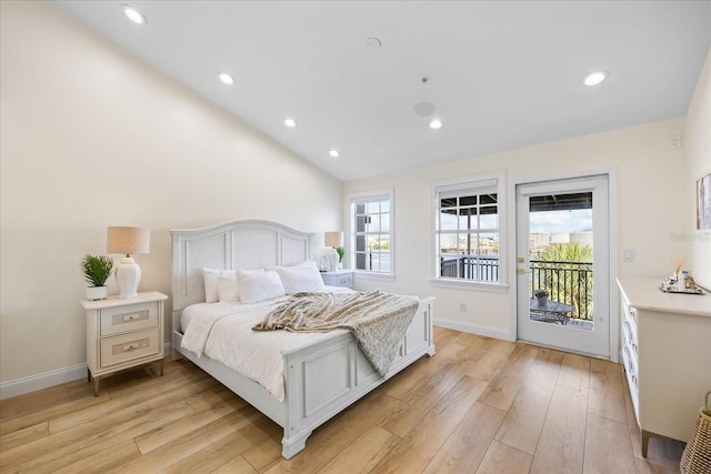 1476 Harbour Walk Rd, Tampa, FL 33602 - bedroom featuring access to exterior, light wood-style floors, recessed lighting, baseboards, and lofted ceiling