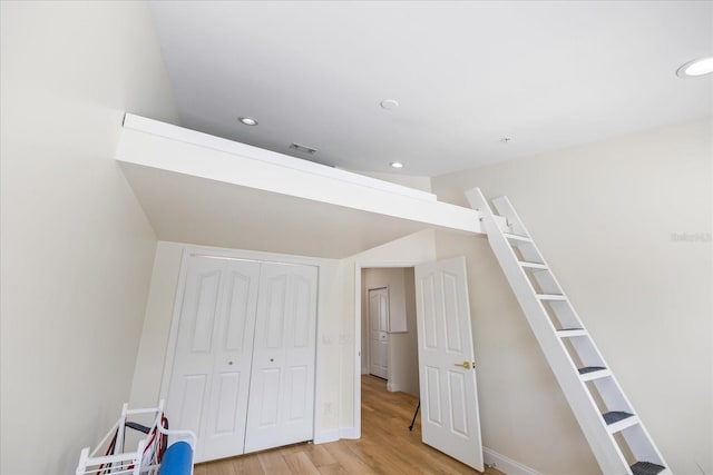 1476 Harbour Walk Rd, Tampa, FL 33602 - unfurnished bedroom with light wood-type flooring, recessed lighting, a closet, and baseboards