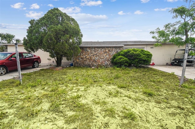 view of front of home with stone siding