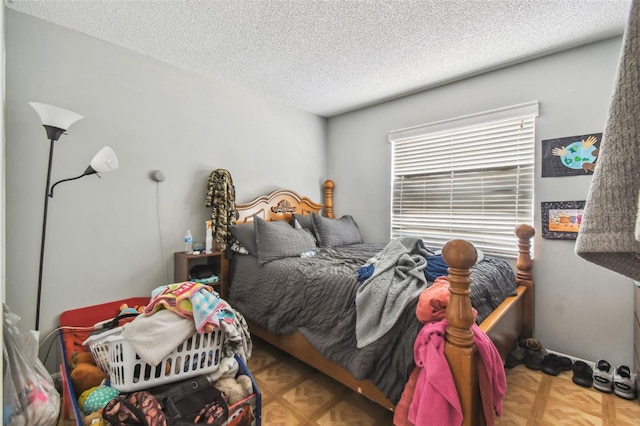 bedroom with a textured ceiling