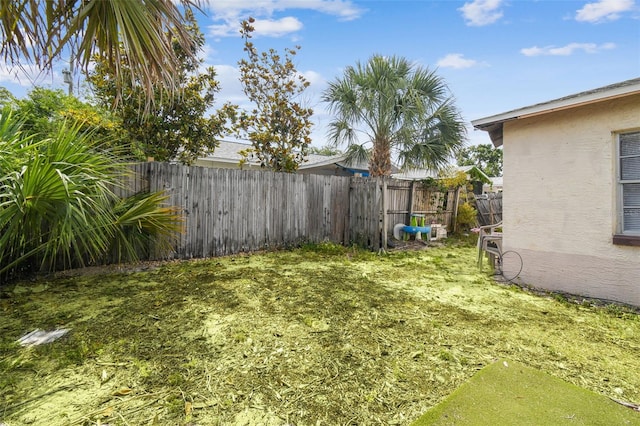 view of yard featuring a fenced backyard