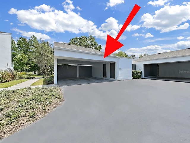 exterior space featuring stucco siding