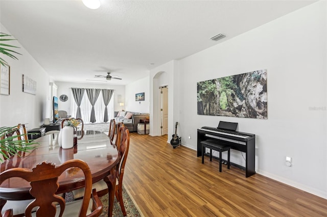 19129 Lake Audubon Dr, Tampa, FL 33647 - dining area with light wood-style floors, baseboards, a ceiling fan, and visible vents
