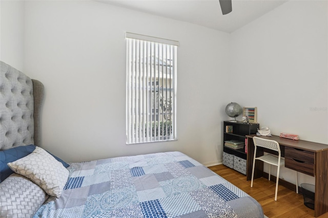 19129 Lake Audubon Dr, Tampa, FL 33647 - bedroom with baseboards, ceiling fan, and wood finished floors