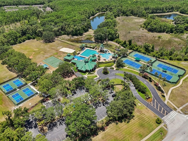 19129 Lake Audubon Dr, Tampa, FL 33647 - aerial view featuring a water view and a wooded view