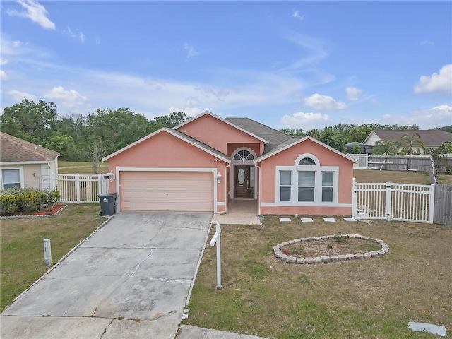 4617 Horseshoe Pick Ln, Valrico, FL 33594 - view of front facade featuring concrete driveway, an attached garage, and stucco siding