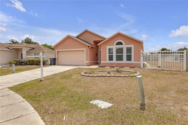 4617 Horseshoe Pick Ln, Valrico, FL 33594 - ranch-style house with driveway, a garage, and stucco siding