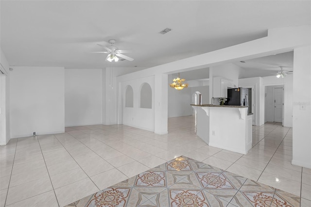 4617 Horseshoe Pick Ln, Valrico, FL 33594 - unfurnished living room with ceiling fan, light tile patterned floors, and vaulted ceiling