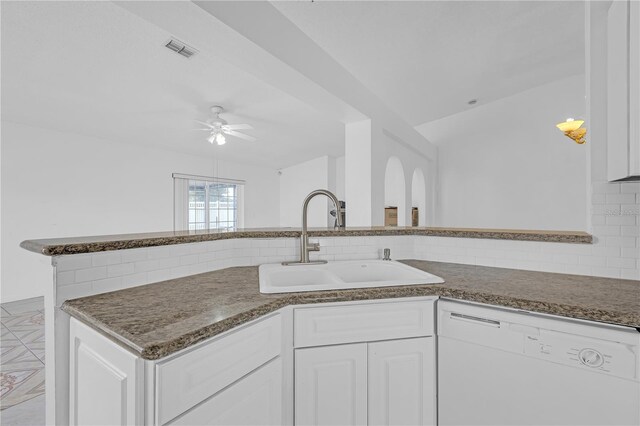 4617 Horseshoe Pick Ln, Valrico, FL 33594 - kitchen featuring dishwasher, a sink, backsplash, ceiling fan, and white cabinetry