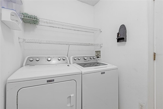 4617 Horseshoe Pick Ln, Valrico, FL 33594 - clothes washing area with separate washer and dryer