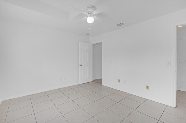 4617 Horseshoe Pick Ln, Valrico, FL 33594 - unfurnished room featuring light tile patterned flooring, ceiling fan, and baseboards