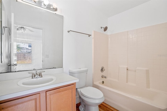 full bathroom with vanity, toilet, and shower / tub combination