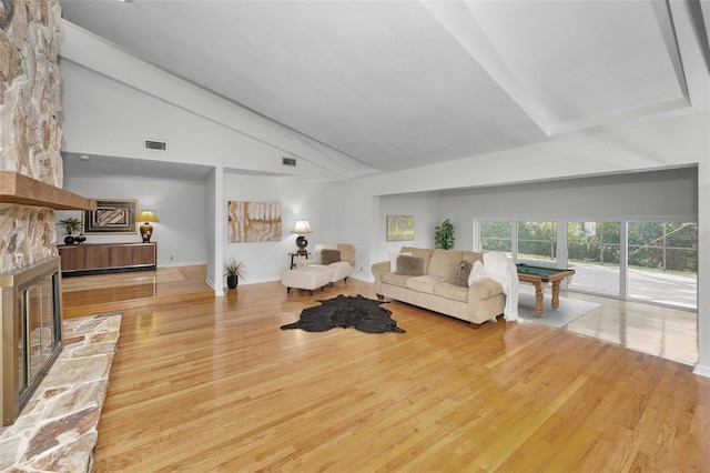 833 Lakeside Ter, Palm Harbor, FL 34683 - living area with billiards, visible vents, a fireplace, wood finished floors, and baseboards