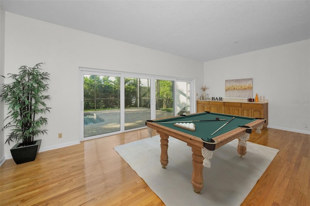 833 Lakeside Ter, Palm Harbor, FL 34683 - playroom with light wood-style floors, billiards, and baseboards