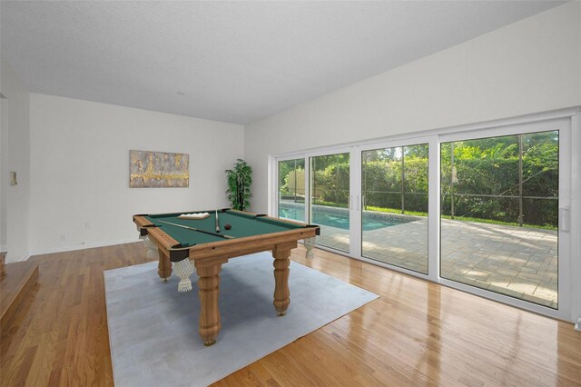 833 Lakeside Ter, Palm Harbor, FL 34683 - playroom featuring pool table and wood finished floors
