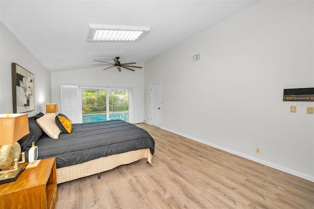 833 Lakeside Ter, Palm Harbor, FL 34683 - bedroom featuring visible vents, vaulted ceiling, light wood-type flooring, baseboards, and access to outside