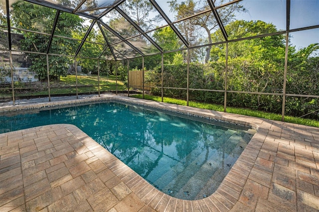 833 Lakeside Ter, Palm Harbor, FL 34683 - pool with glass enclosure and a patio area