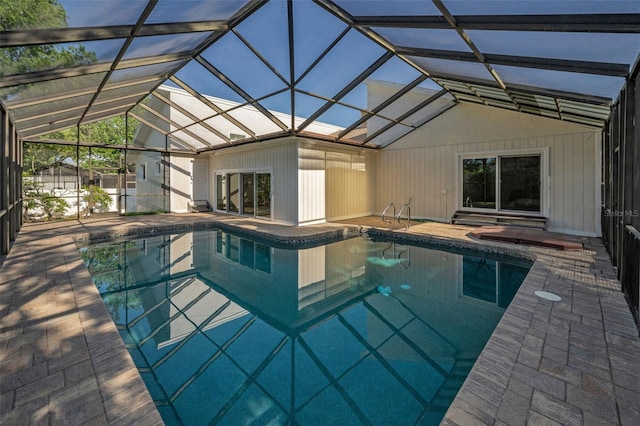 833 Lakeside Ter, Palm Harbor, FL 34683 - outdoor pool with glass enclosure and a patio area