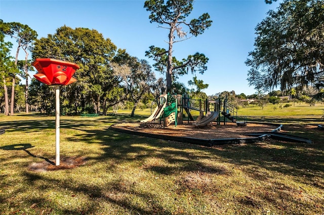 833 Lakeside Ter, Palm Harbor, FL 34683 - community play area with a lawn